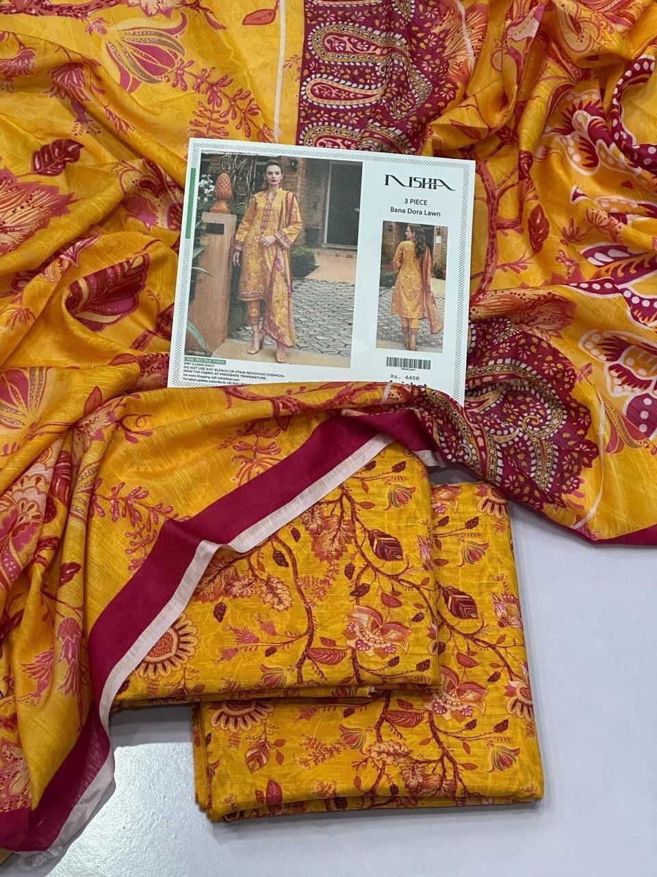 Nishat Lawn Unstitched 3 Piece Suit | Colour- Yellowish Orange Nishat Lawn Unstitched 3 Piece Suit | Colour- Yellowish Orange