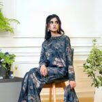 women wear Khaadi Lawn 3 Piece Suit in Dark Grey Blue