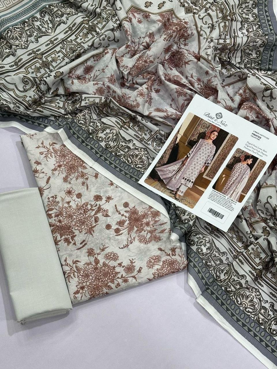 Bint e Naz Lawn Unstitched 3 Piece Suit | Colour-Grey Nickel Suit Bint e Naz Lawn Unstitched 3 Piece Suit | Colour-Grey Nickel Suit