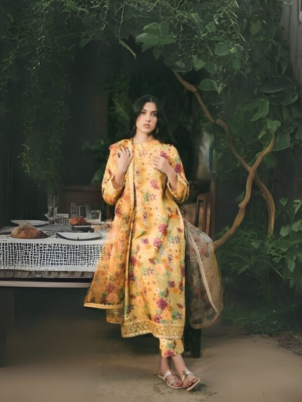 Women wear Iznik Lawn Unstitched 3 Piece Suit in Ginger Brown