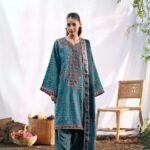 Women wear Grey-blue Xenia Lawn suit