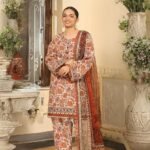 women wear Asim Jofa Lawn Fabric 3 Piece Suit | Colour-Light Peach