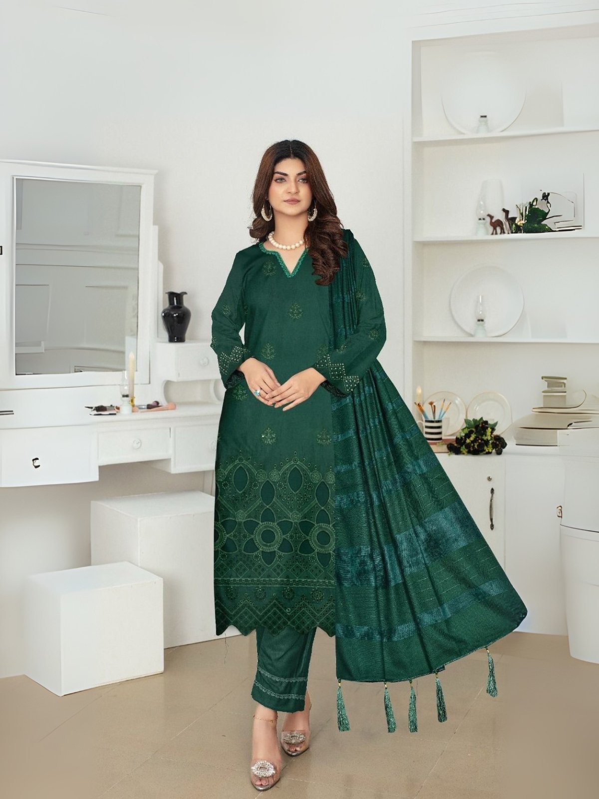 Women wear Bint-e-Naz Embroidered Suit in Green Pea Women wear Bint-e-Naz Embroidered Suit in Green Pea