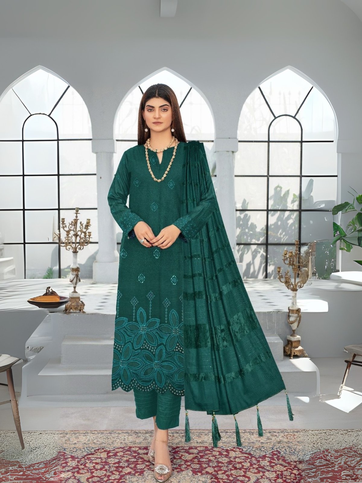 Women wear Bint-e-Naz Embroidered Suit in Teal Green Women wear Bint-e-Naz Embroidered Suit in Teal Green