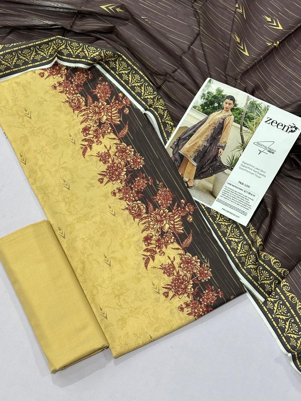 Zeen Lawn Unstitched 3 Piece Suit in Ginger Brown. Zeen Lawn Unstitched 3 Piece Suit in Ginger Brown.