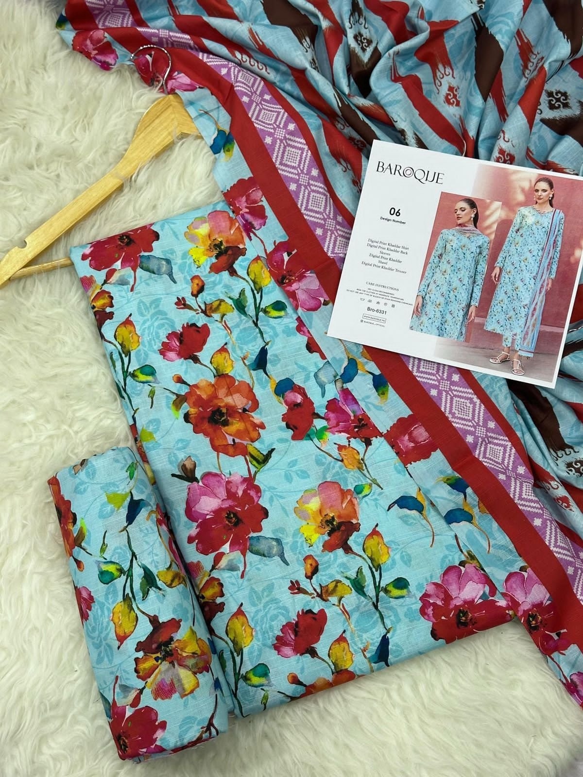 Khaddar Unstitched 3 Piece Suit in Cloudy Blue Baroque Khaddar Unstitched 3 Piece Suit in Cloudy Blue