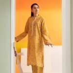 Model Wearing Digital Print Khaddar Suit in Brownish Orange