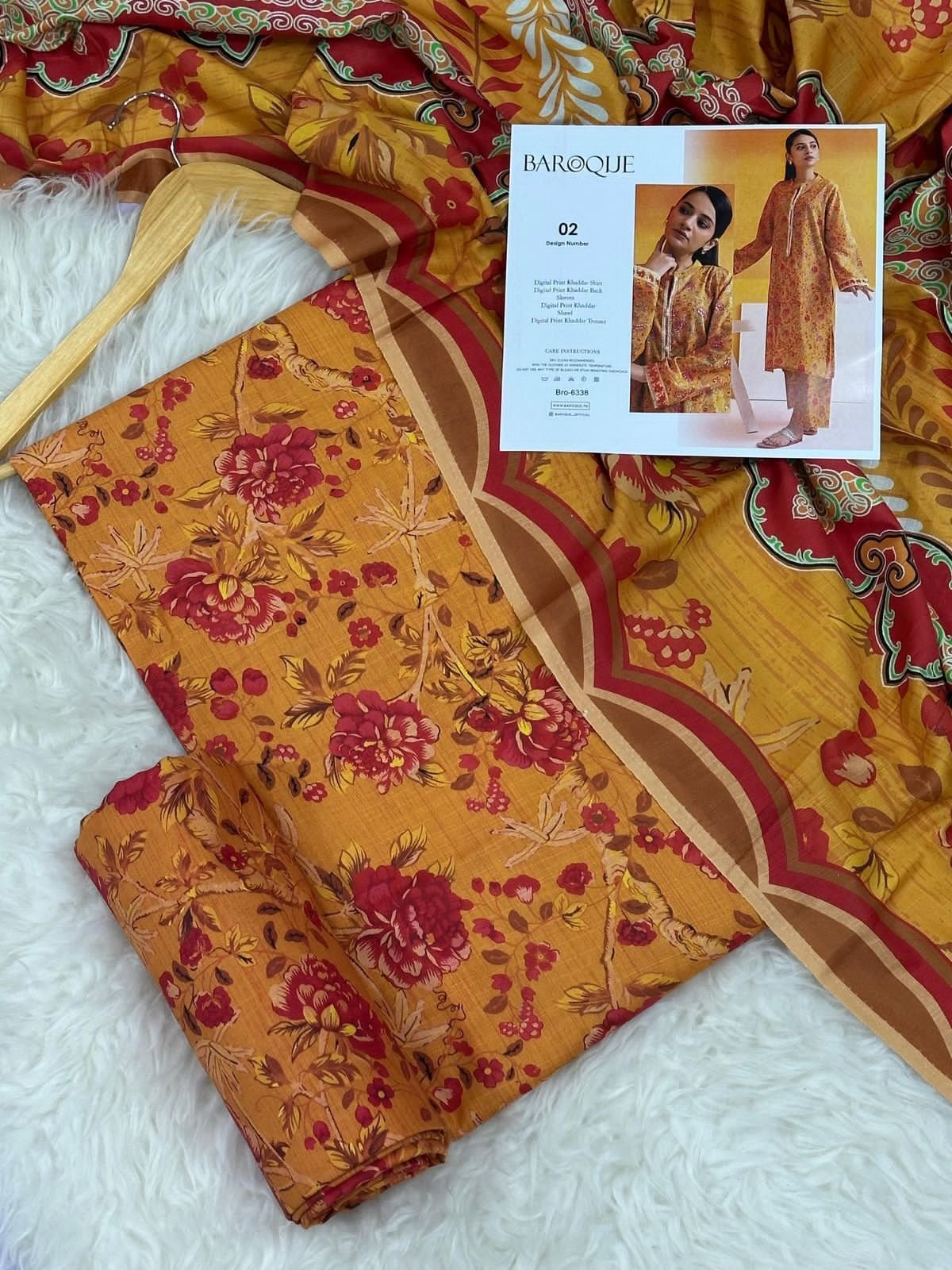 Khaddar Unstitched 3 Piece Suit in Brownish Orange Baroque Khaddar Unstitched 3 Piece Suit in Brownish Orange