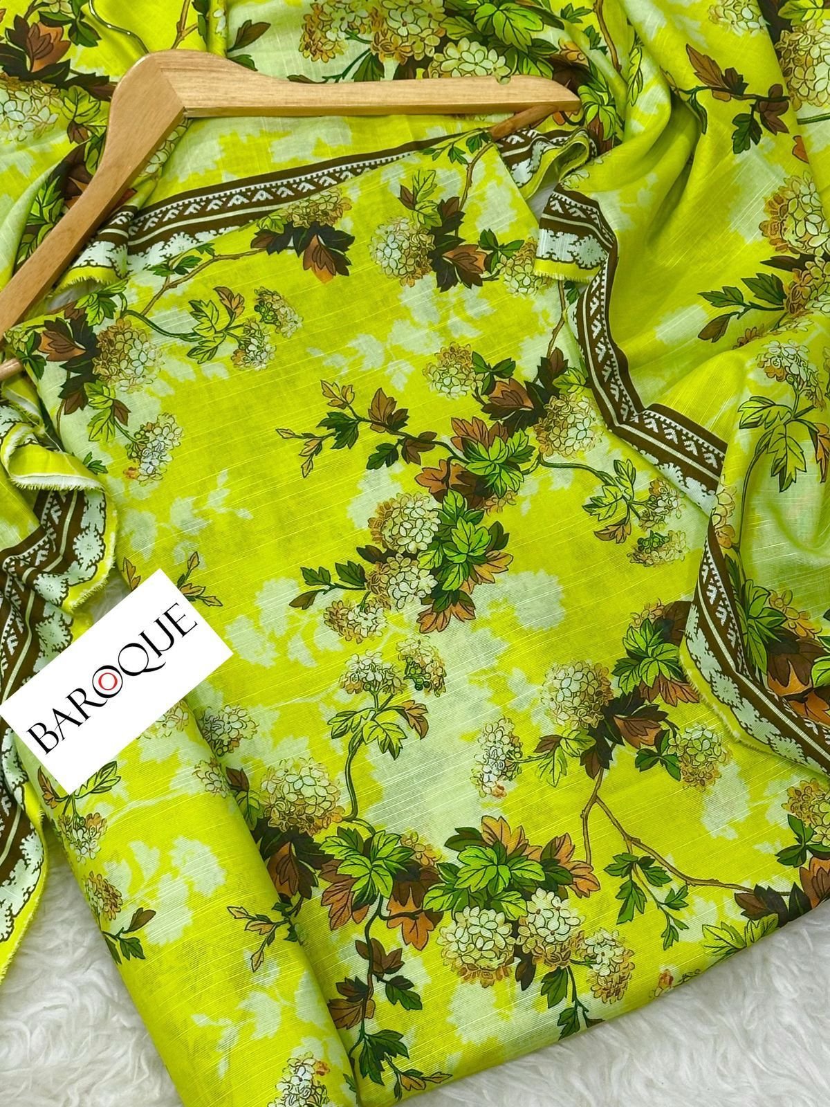 Khaddar Unstitched 3 Piece Suit in Olive Yellow Baroque Khaddar Unstitched 3 Piece Suit in Olive Yellow