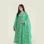 Model Wearing Digital Print Khaddar Suit in Greeny Blue