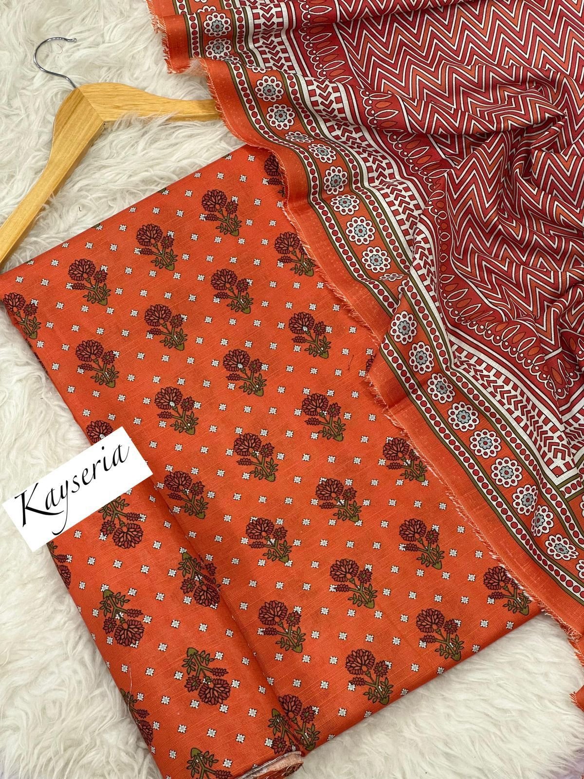 Khaddar Unstitched 3 Piece Suit in Pale Red Kayseria Khaddar Unstitched 3 Piece Suit in Pale Red