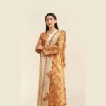 Model Wearing Digital Print Khaddar Suit in Vanilla